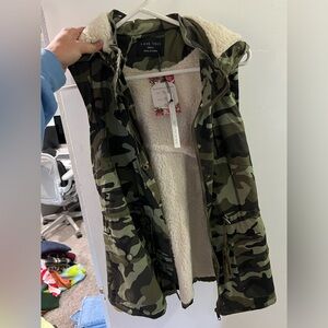 Camo vest. Sherpa inside.